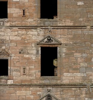Courtyard, north facade, detail of window pediment