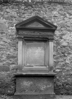 Detail of tombstone to Grants of Elchies in wall of churchyard.