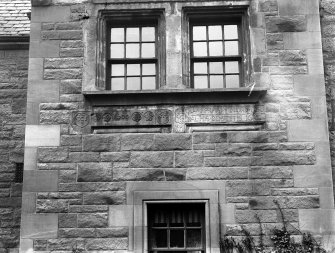 Detailed view of sculptured stones on west facade.