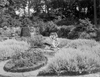 View of garden with Atlas figure.