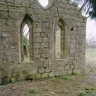 Detail of two arched windows in E gable.