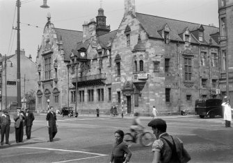 Glasgow, 840 Govan Road,  Pearce Institute
General view from North West with people in foreground.