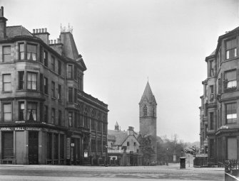 EPS/40/4  Photograph with text: 'Hope Park Terrace - looking West from Clerk Street, showing Hope Park and Buccleuch Congregational Church; Hope Park United Free Church and entrance to Melville Drive'.
Edinburgh Photographic Society Survey of Edinburgh and District, Ward XIV George Square