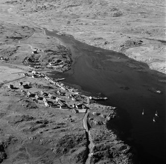 Oblique aerial view of Arinagour, taken from the south, centred on the town.
