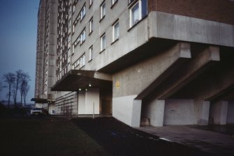 Dundee, Ardler Estate, Birkdale Place (Phase I): Ground floor view of entrances to Ardler Estate multi-storey block, showing concrete stanchions.