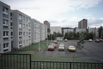 Dundee, Ardler Estate, Birkdale Place (Phase I): General view of 4-storey low rise blocks surrounding a car park.