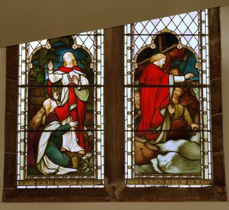 Interior.
Detail of lower section of stained glass window at ground floor level.