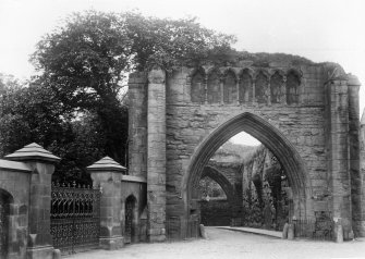 General view of West Port. 
Titled: 'Gate-way, St Andrews, Fifeshire'.
