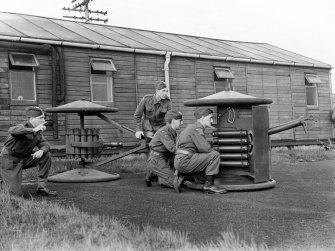 View - detail of Home Guard unit at Gun Drill showing Smith gun with limber and ready use ammunition.