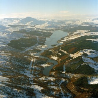 General oblique aerial view of the Loch Tummel reservoir with Schiehallion in the distance, taken from the ENE.