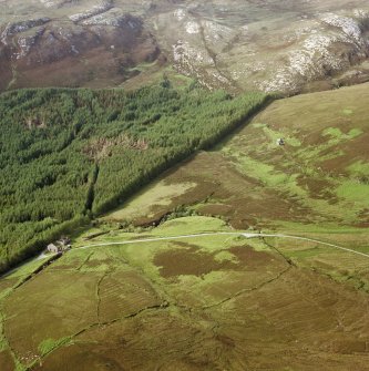 Oblique aerial view of No. 1 mine, blowing engine house and surface buildings, Raasay.