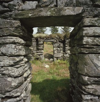 Arichonan Township.
Detail of barn B2, showing cruck-slots in North wall and dated lintel.