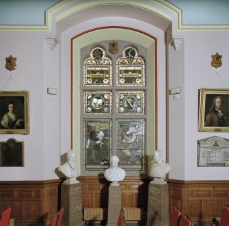 Inverness Town House, interior.  First floor: detail of stained glass window in the centre of the North wall of the main hall