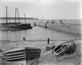 View of Cullen harbour wall from SW.