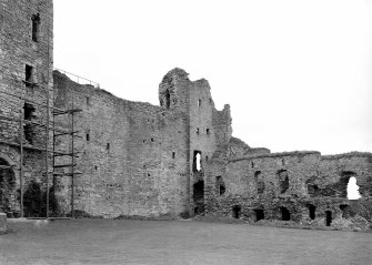 View of interior of curtain wall, N side.