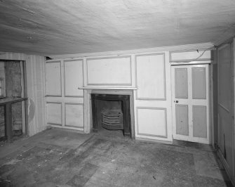 Interior.
Ground floor, rear wing, E appartment, detail of panelling and fireplace.