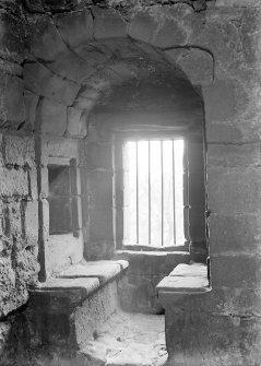 Interior.
View of window with stone benches on second floor wing.