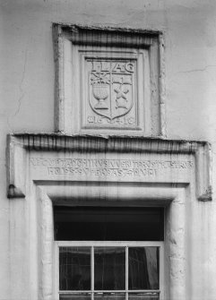 Detail of lintel and heraldic panel.
