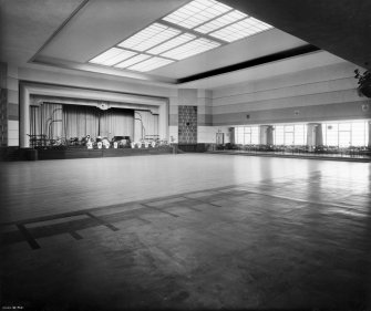 Interior.
General view of main hall including stage from North-East.
Insc:'Annan 38.548'
Stamped: 'J. and J. A. Carrick Architects, Ayr'
