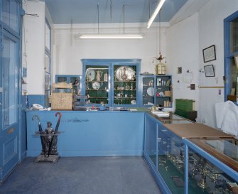 Interior. Ground floor. View of shop front from SW