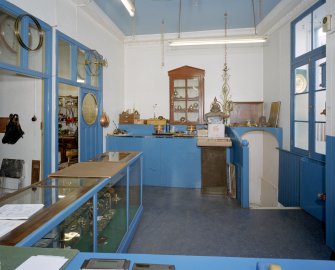 Interior. Ground floor. View of shop front from NE