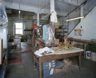 Interior. Lower ground floor. View of workshop from NW