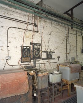 Interior. Lower ground floor. Workshop. Detail of plating tanks and control switches