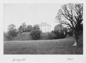 Copy of historic photograph showing general view.