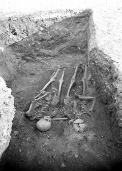 Photograph of two skeletons found in 1900s castle excavations