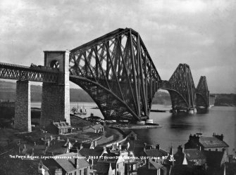 View of the bridge in use seen from North Queensferry. 
Titled. 'The Forth Bridge. Length including Viaduct 8098 Ft. Height 369 Ft. Spans 1710 Ft each.  917.'