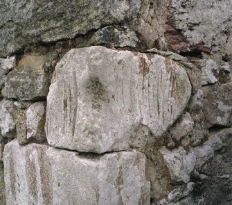 Shaw enclosure, detail showing knife-sharpening marks on stone at south east corner