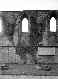 Historic photographic detail of S wall of aisle.