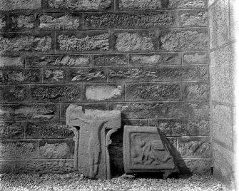 Kilmartin, Kilmartin Churchyard.
View showing detail of arm of Kilmartin cross and small crosshead (RCAHMS 87).