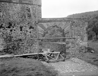 View of courtyard gateway during repair.