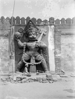 Statue (in semi relief) of Hanuman (now enclosed), at the south entrance (Horse Gate) to the Jagganath Temple, Puri, Orissa.