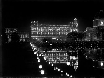 Royal Insurance Building, Kolkata from across the Lal Dighi tank, lit for the British royal visit.