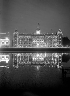 The 'new' Bengal Club, Kolkata lit for British royal visit; seen from across the General's Tank on the Maidan.  This part of the club is now demolished, having been completed in 1908 by the architect J Vincent Esch (who was also supervising architect for the Victoria Memorial, Kolkata).