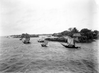 Possible large lake or coastal scene with fishing boats.  Unknown location.
