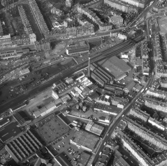 Oblique aerial view of Caledonian Distillery, Haymarket, Edinburgh