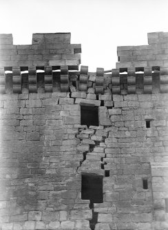 Detail of old tower wall and battlements.