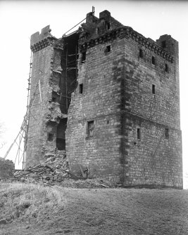 View from SE showing removal of damaged stonework.