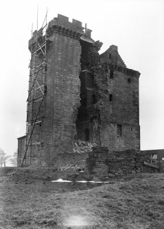 View from SE showing removal of damaged stonework.