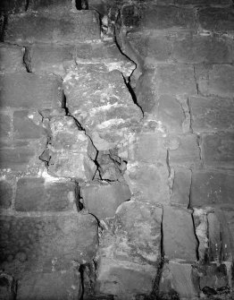 Detail of cracks in stonework.