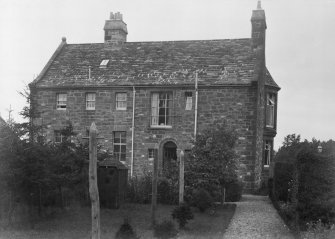 Photographic view of rear elevation.
