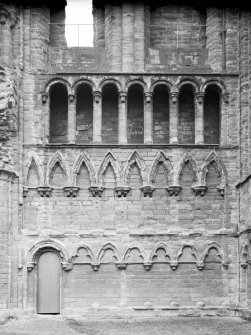 Detail of tiered arches on S transept wall.