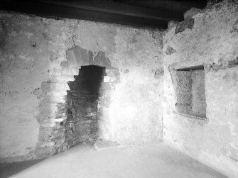 Dundee, Claypotts Road, Claypotts Castle, interior.
General view of fireplace and wooden beams of roof.
















