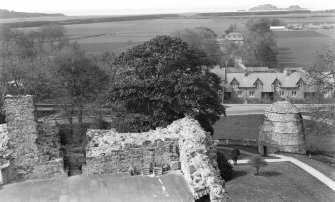 View of dovecot and end of E range wall.