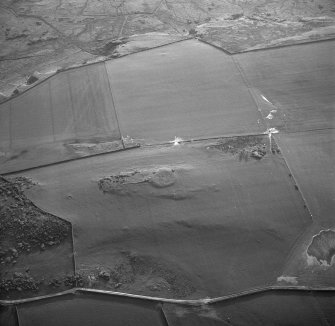 General oblique aerial view centred on the enclosure, taken from the E.