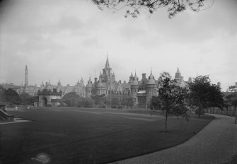 General view of Royal Infirmary from grass terrace of George Heriot's Hospital School. Includes school's lodge.