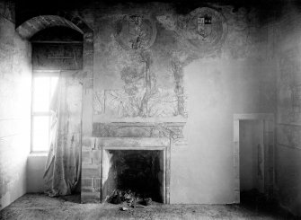 Interior.
View of painted E wall of S room including fireplace.
